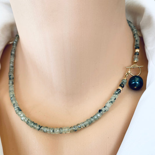 Prehnite tahitian pearl necklace featuring translucent green prehnite beads and black Tahitian pearl