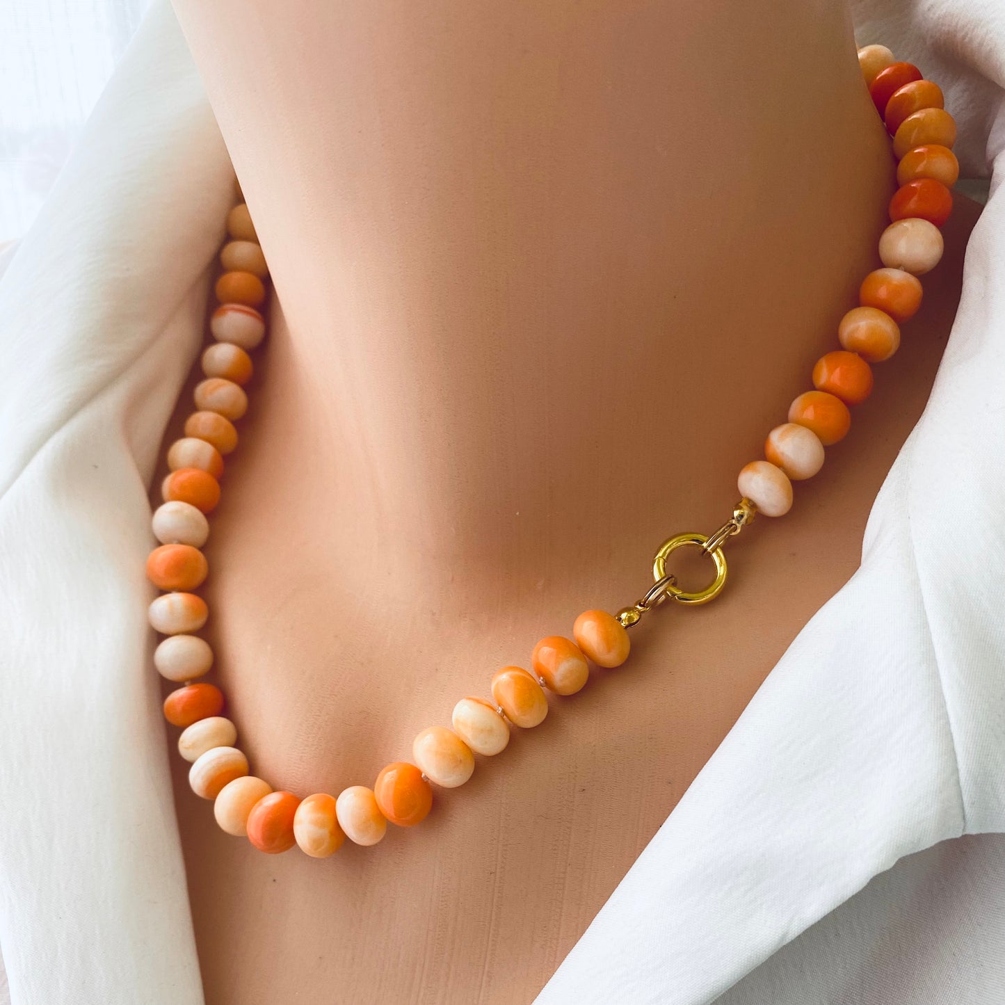 Orange opal candy necklace worn on neck with gold vermeil clasp, handmade gemstone jewelry from Canada