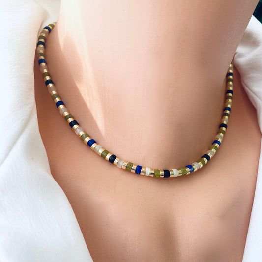 Gemstone choker necklace with multi color beads and hematite, showcasing vibrant tube-shaped gemstones.