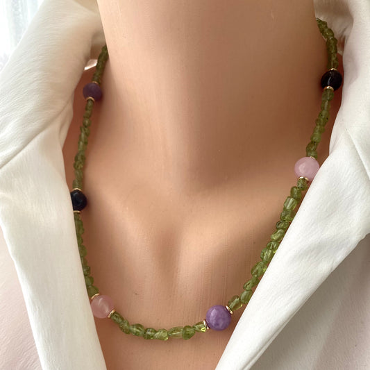 Peridot bonbons necklace worn on neck with jade and amethyst accents, handmade gemstone jewelry from Canada