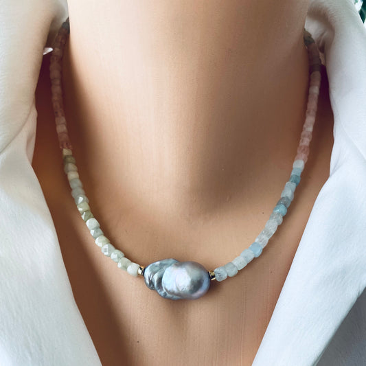 Aquamarine morganite pearl necklace worn at the neckline with grey freshwater baroque pearl