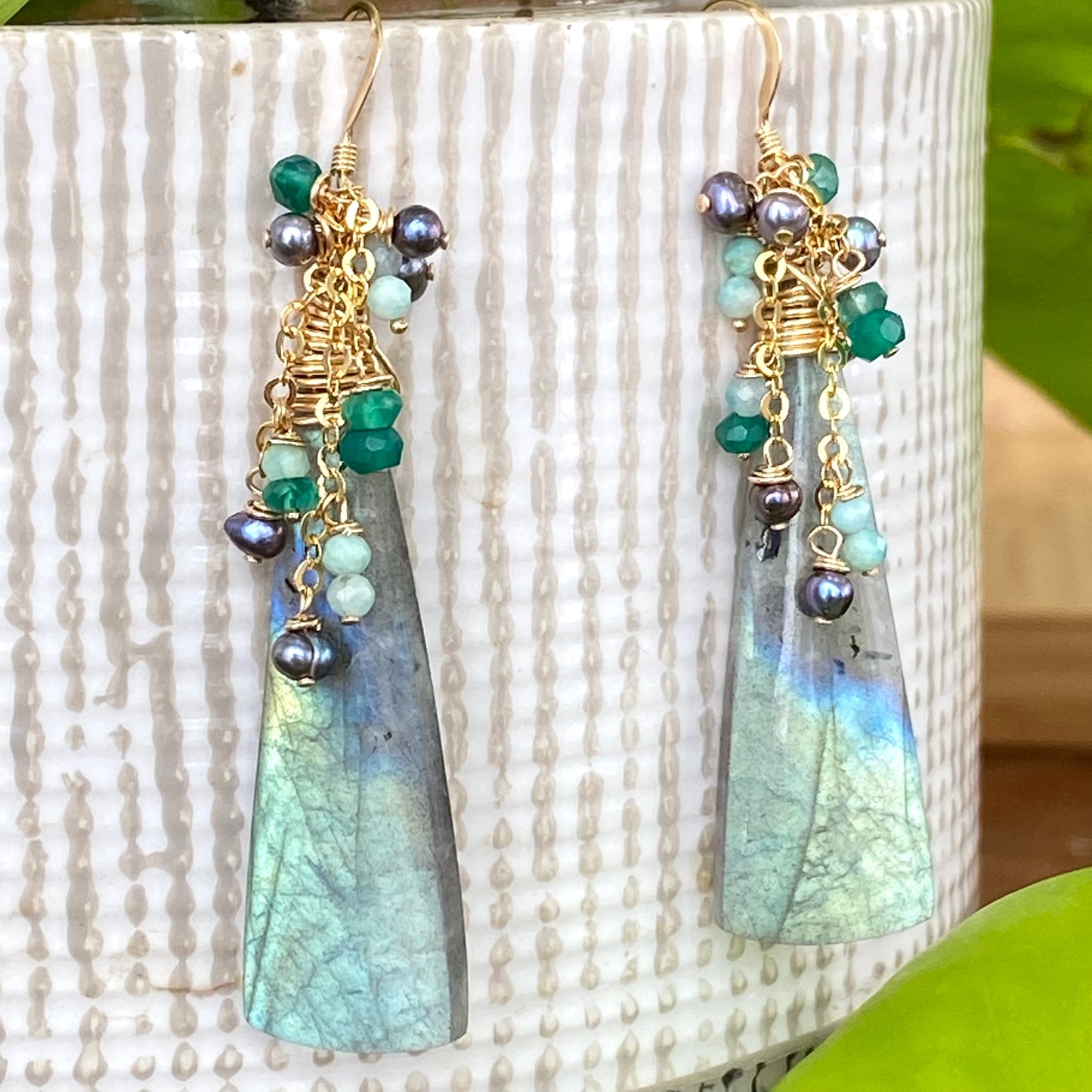 Labradorite amazonite green onyx black pearl earrings worn on model showing elongated drop style