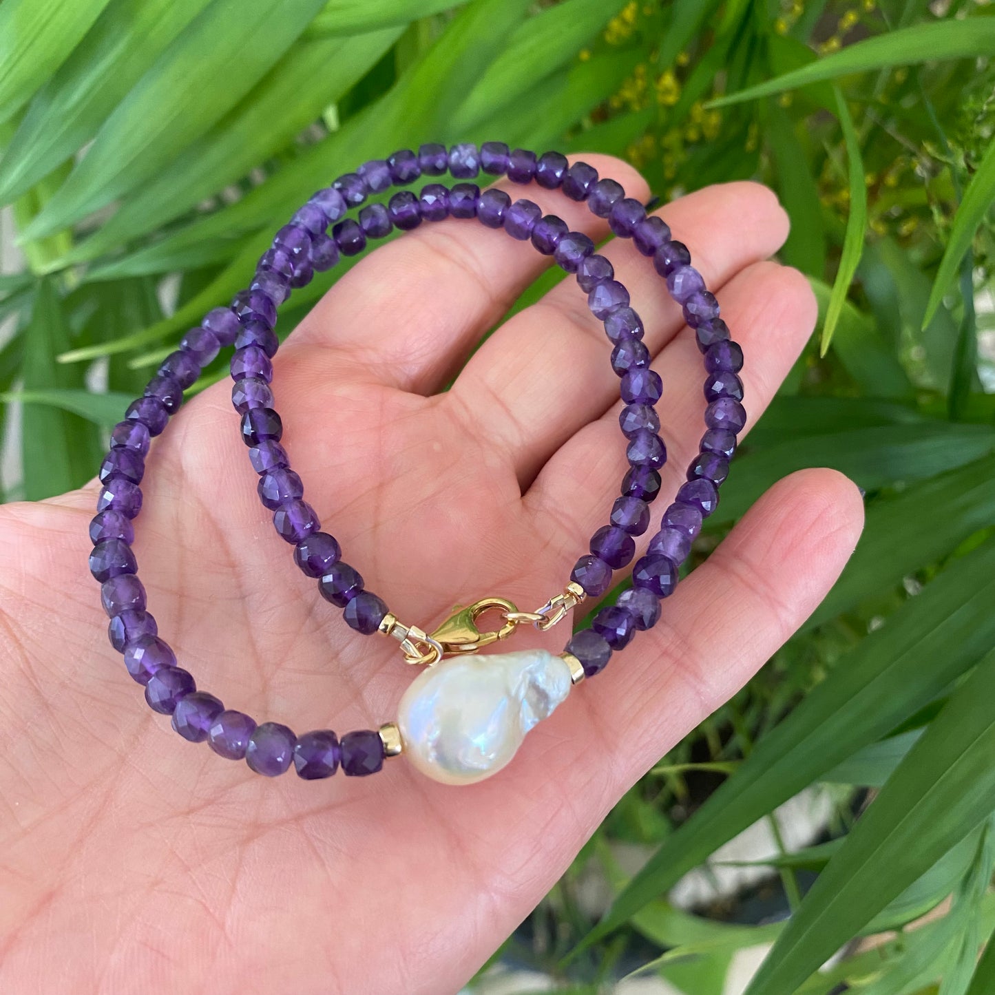 Amethyst baroque pearl necklace with faceted purple amethyst beads and freshwater pearl centerpiece