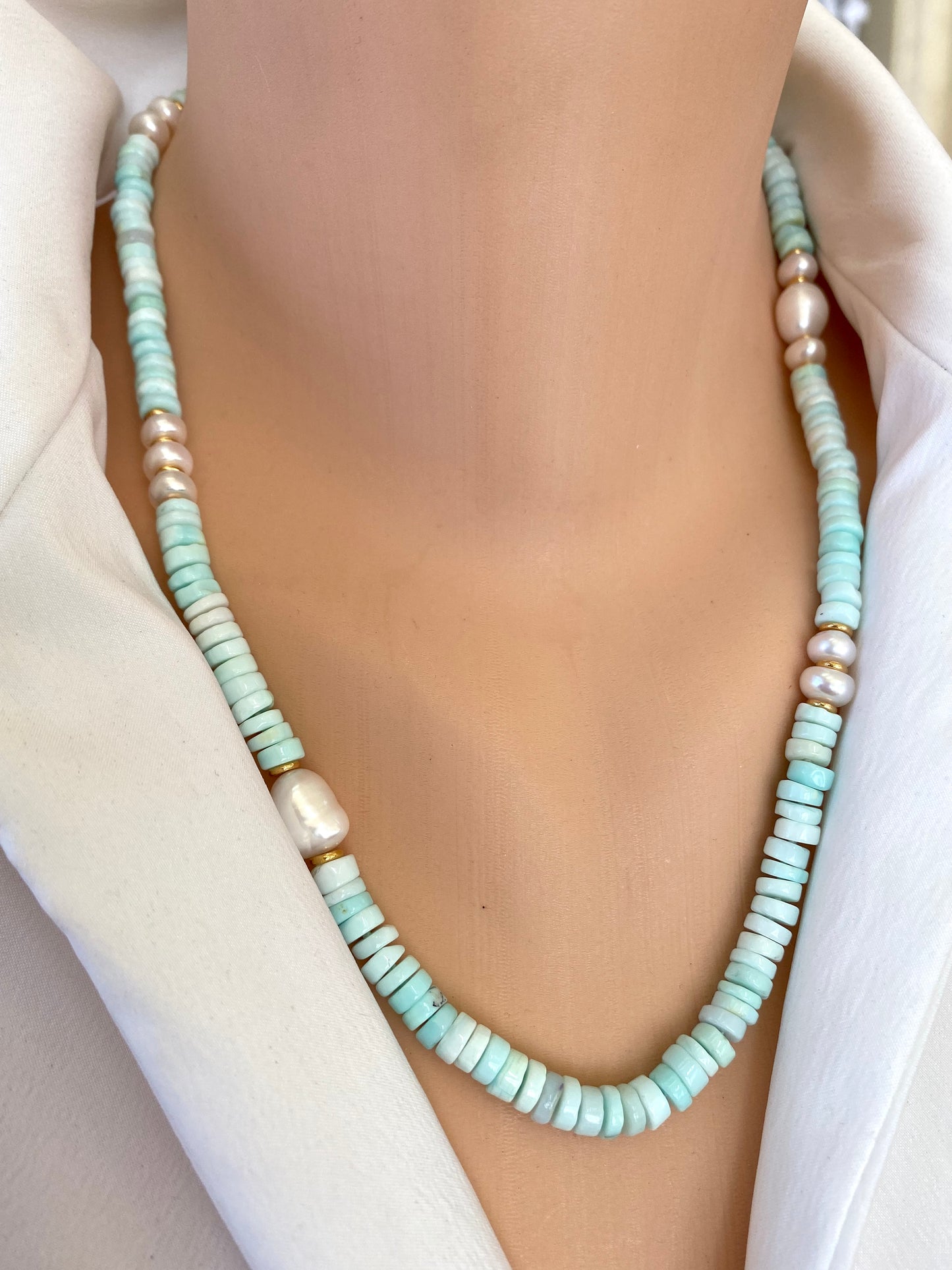 Sky blue opal pearl necklace worn on neck highlighting soft blue gemstone tones, handmade Canadian jewelry