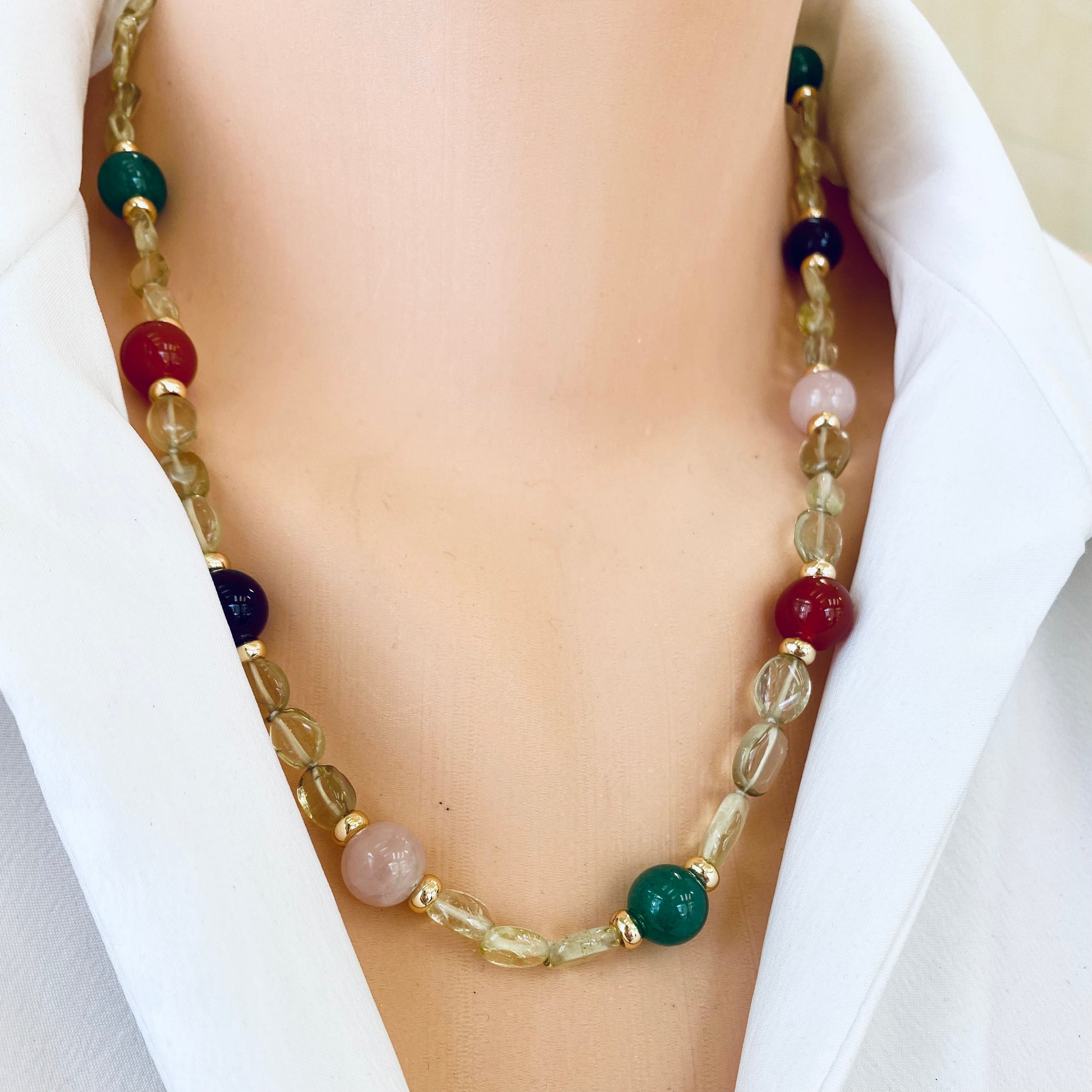 Prasiolite bonbons necklace close-up on neckline with green amethyst and carnelian beads, handcrafted in Canada