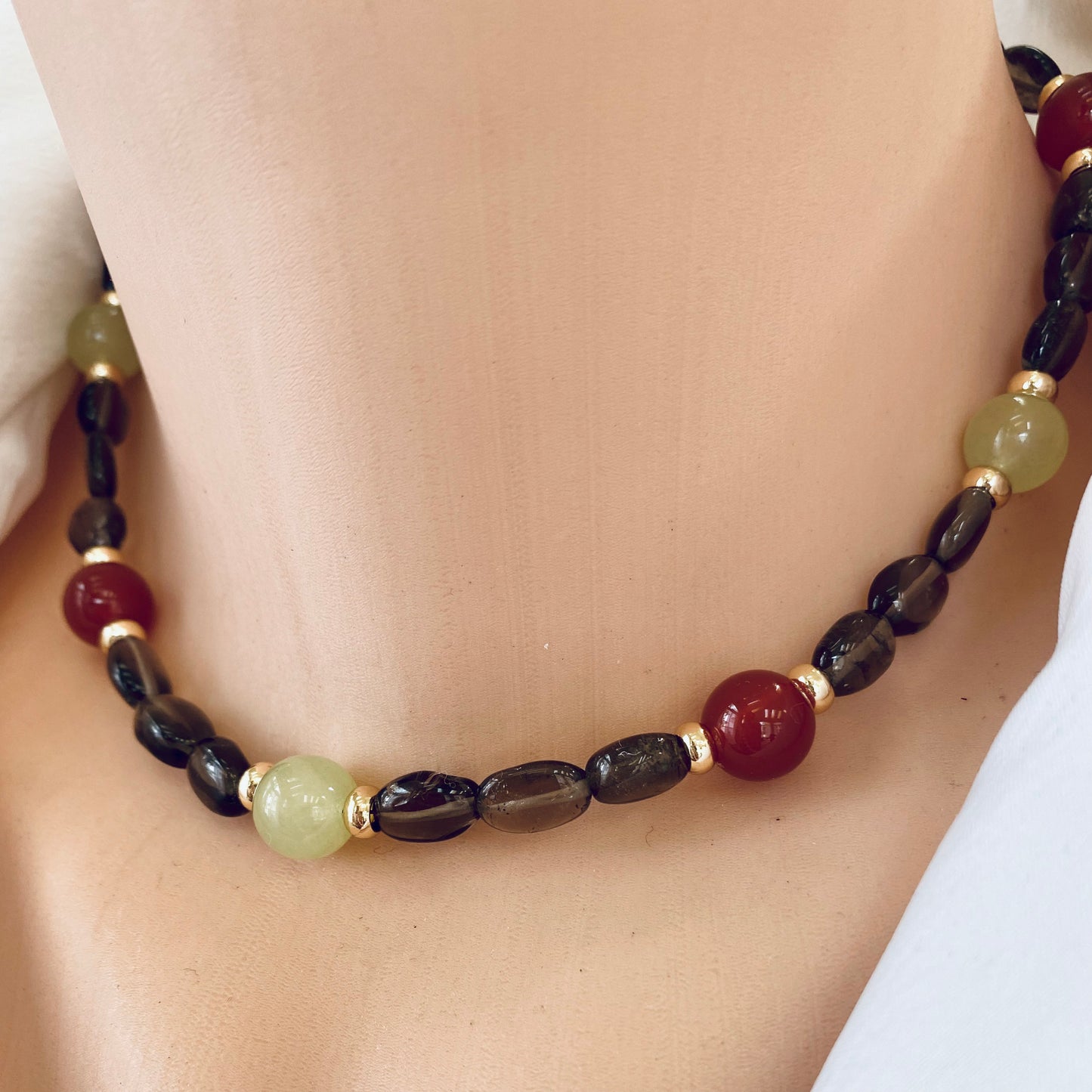 Smoky quartz bonbons choker necklace worn on neck with jade and carnelian accents, handmade in Canada