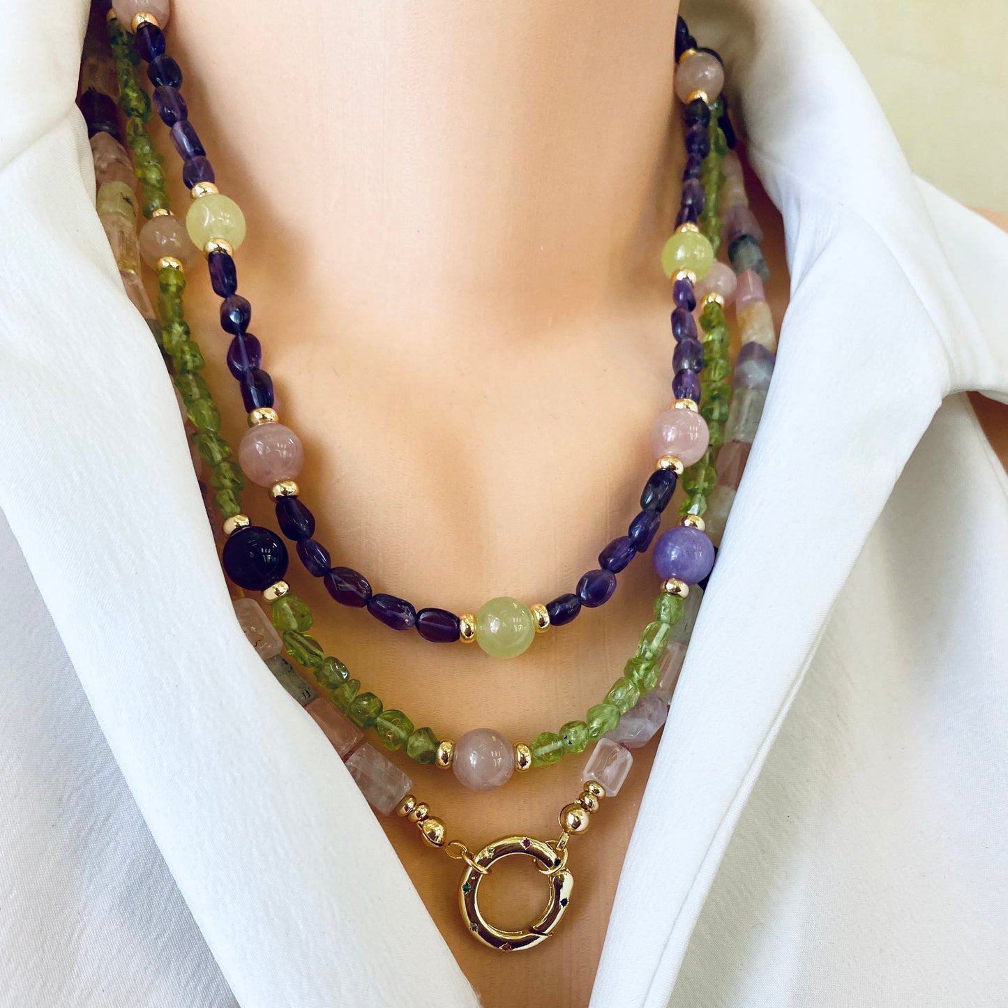 Layered mixed gemstone necklace styling with gold plated charm holder clasp, handmade Canadian statement jewelry