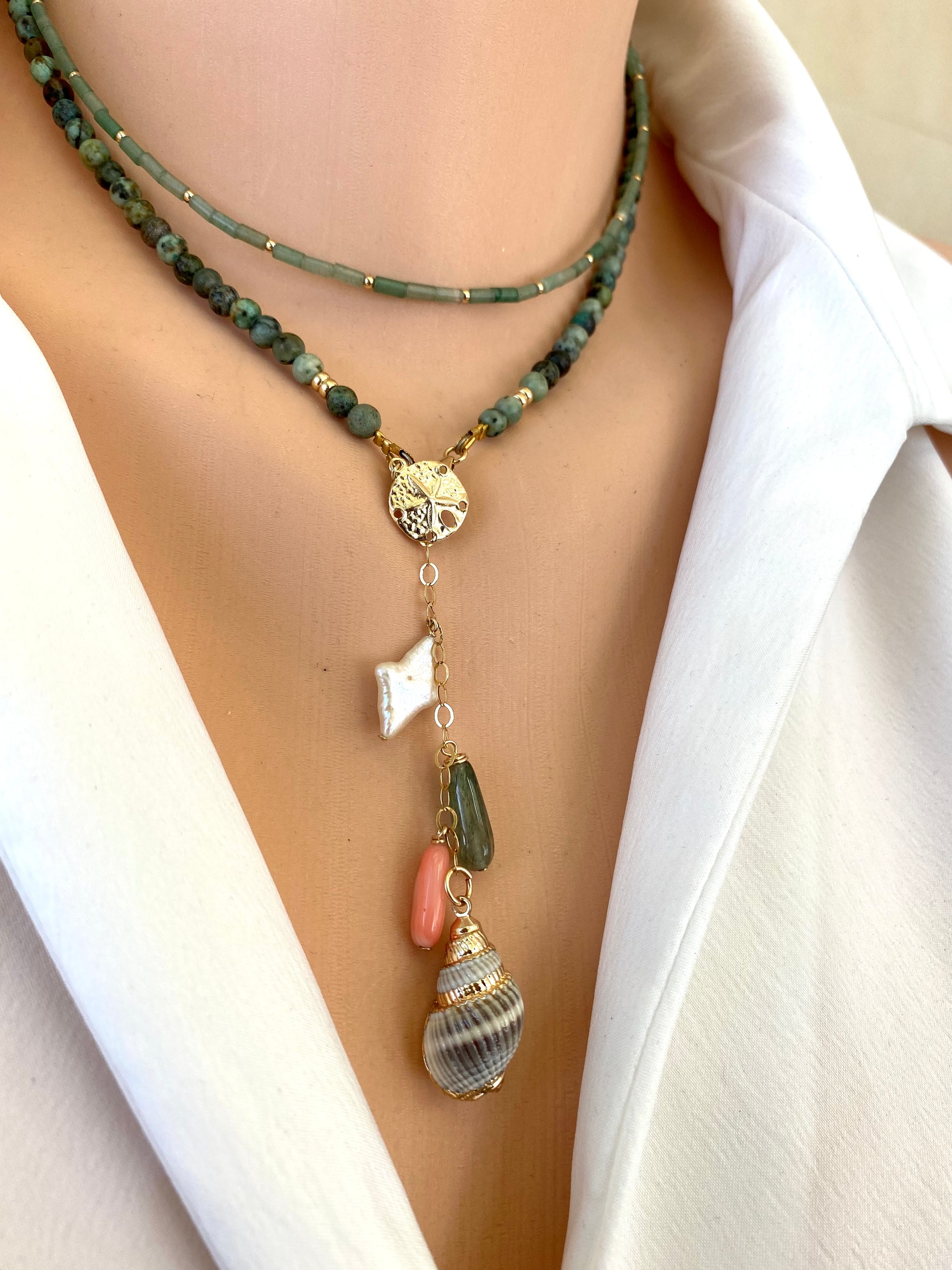 Lapis lazuli onyx choker necklace worn on model with green onyx and pendant layering