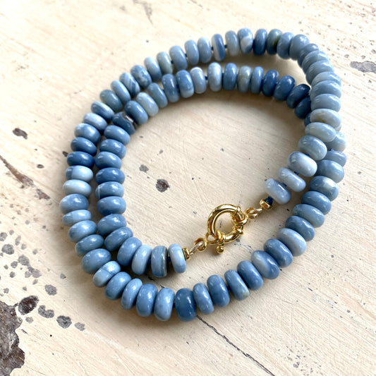 Blue opal necklace flat lay, graduated Oregon blue opal rondelle beads with vermeil marine clasp