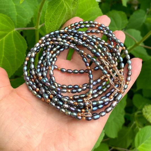 Black pearl necklace gold filled coiled in hand, freshwater peacock mini rice pearls and rose gold filled clasp