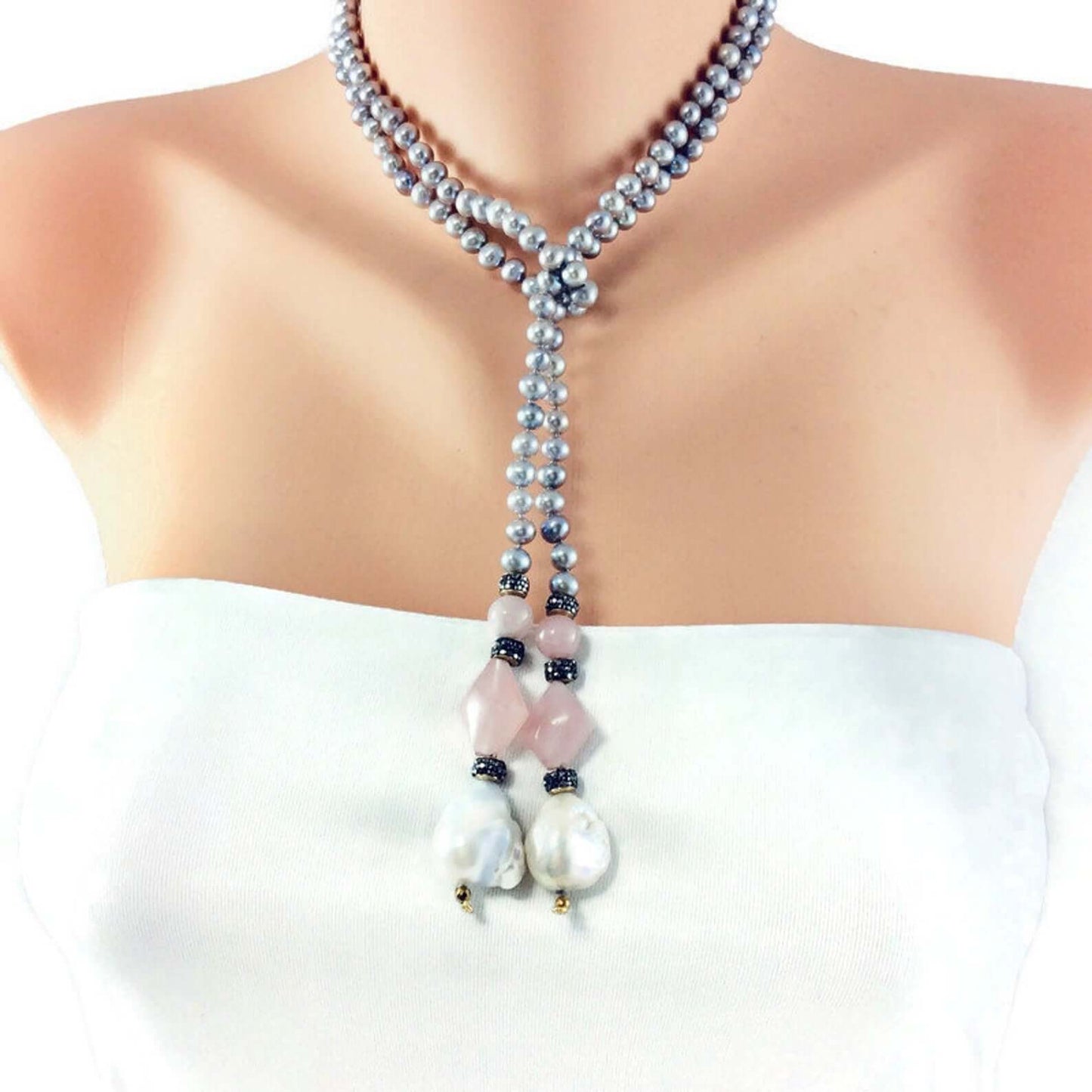 pastel pearl lariat necklace featuring blue-gray freshwater pearls, pink rose quartz, and baroque pearls.
