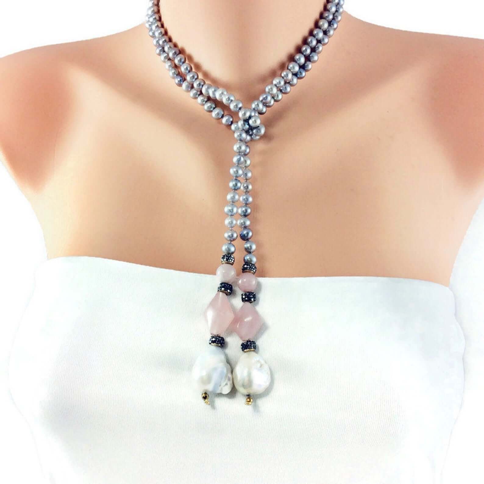pastel pearl lariat necklace featuring blue-gray freshwater pearls, pink rose quartz, and baroque pearls.