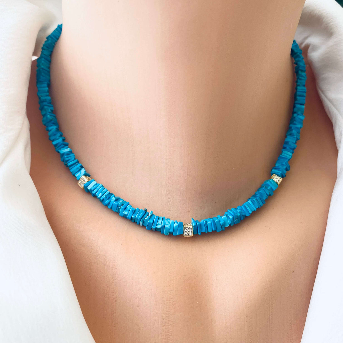 Turquoise choker necklace with natural turquoise beads displayed on a mannequin, showcasing vibrant color and elegance.